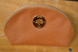 A ladies clutch bag.