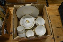 Derby part tea service, cream ground with gilt rims.