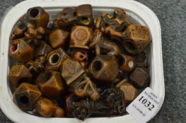 A quantity of Oriental small carvings.
