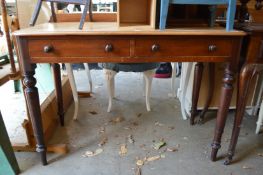A Victorian mahogany two drawer side table.