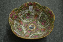 A Chinese famille rose bowl with wavy shaped rim.