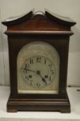 A mahogany cased mantle clock.