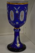 A Bohemian blue glass goblet.