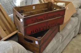A pair of novelty champagne wooden crates.