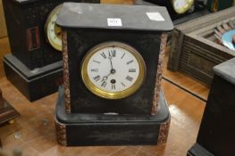 A slate mantel clock.