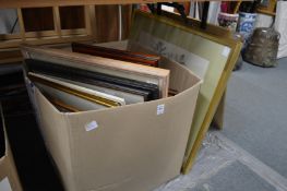 A quantity of paintings and prints.