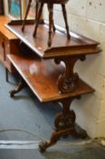 A good Victorian mahogany two tier buffet with carved and pierced end supports.