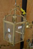 A brassed hexagonal shaped hall lantern.
