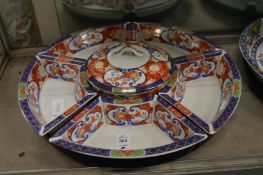 An Oriental porcelain lazy susan/ hors d'oeuvres set.