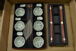Chinese cased sets of chopsticks and bowls.