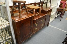 A mahogany sideboard.