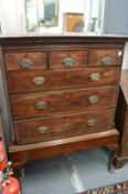 A George III mahogany chest on stand.