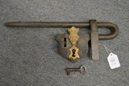 A large Chinese padlock and bar.