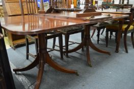 A good Georgian style mahogany twin pedestal dining table with one extra leaf.