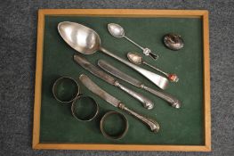 Silver napkin rings, silver spoon etc.