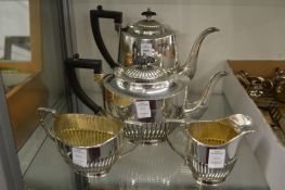 A plated four piece tea and coffee service.