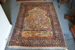 A tree of life style rug (worn) 190cm x 135cm.
