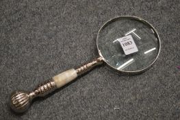 A decorative magnifying glass.