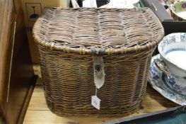 A wicker fishing creel.