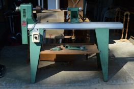 A kitty 664 wood turning lathe with stand.