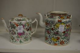 Two Chinese famille rose tea pots.