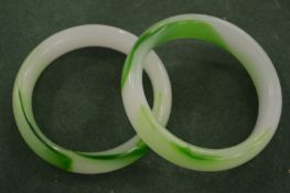 Two Chinese jadeite bangles.