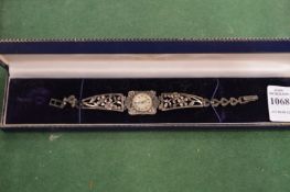 A ladies marcasite cocktail watch.