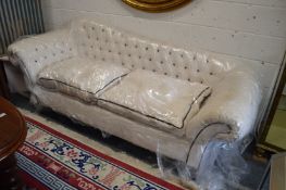 A very good scroll arm humpback large two seat settee, recently re-upholstered to a high standard.