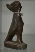 A small Egyptian carved figure.