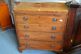 A 19th century mahogany four drawer chest with brushing slide.