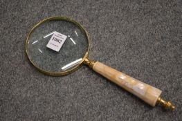 A decorative magnifying glass.