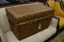 A large wicker basket/trunk.