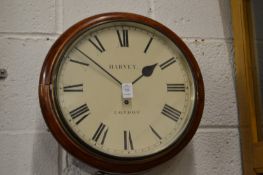 A 19th century mahogany circular wall clock, the dial signed Harvey, London.