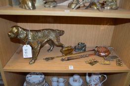 A cast brass model of a dog and other items.