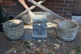 A pair of composite garden planters and a plant stand.