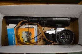 A Praktica camera with accessories.