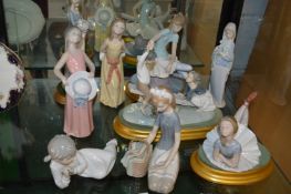A quantity of Lladro figures and figure groups.