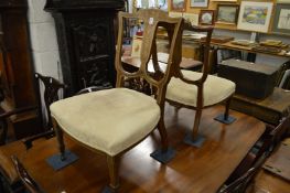 A pair of Edwardian inlaid rosewood occasional chairs (one lacking castors). (awaiting ivory