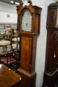 A 19th century oak case long cased clock with painted arch dial.