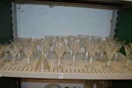 Part suite of cut glass drinking glasses.