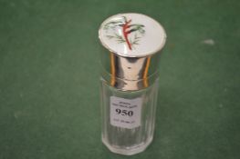 A good cut glass scent bottle with enamel decorated hinged silver cover.