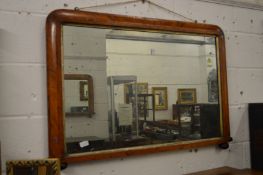 A large Victorian walnut overmantle mirror.