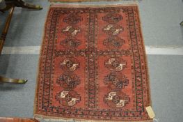 A small Tekke Bokhara rug 125cm x 105cm.