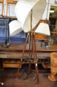 A pair of adjustable table lamps and a floor standing lamp.