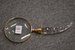A decorative magnifying glass.