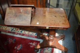 A Victorian mahogany adjustable bed table.