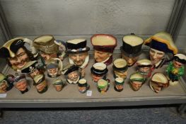 A good collection of Royal Doulton character jugs of various sizes.