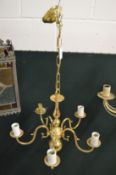 A small Dutch style brass five branch chandelier.