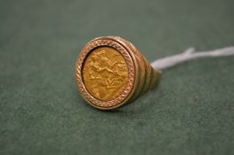 A gentlemen’s half sovereign ring with 9 carat gold mount.