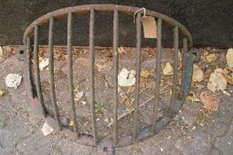 An old wrought iron hay manger.